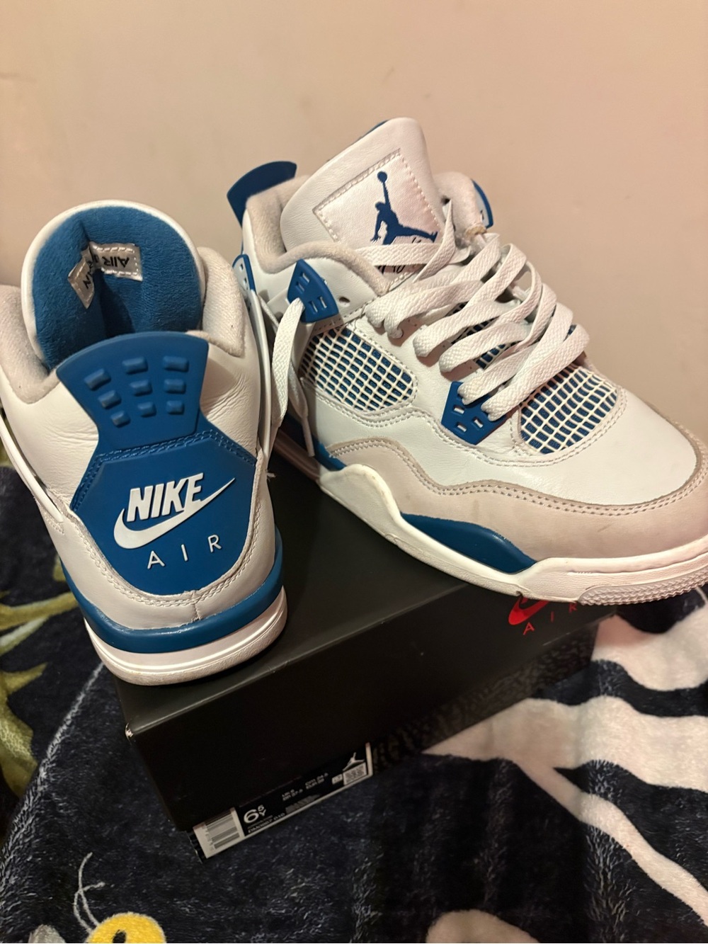Nike White and Blue Air Jordan 4 Sneakers